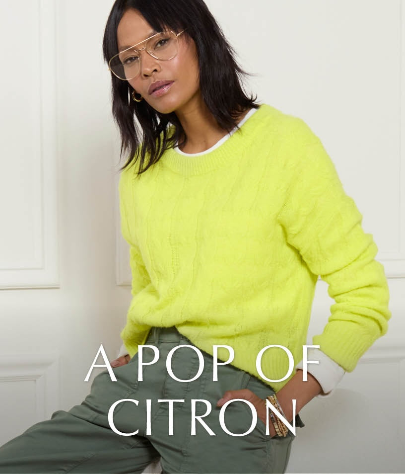 Image of woman wearing a citron yellow sweater. Text reads A Pop of Citron. 