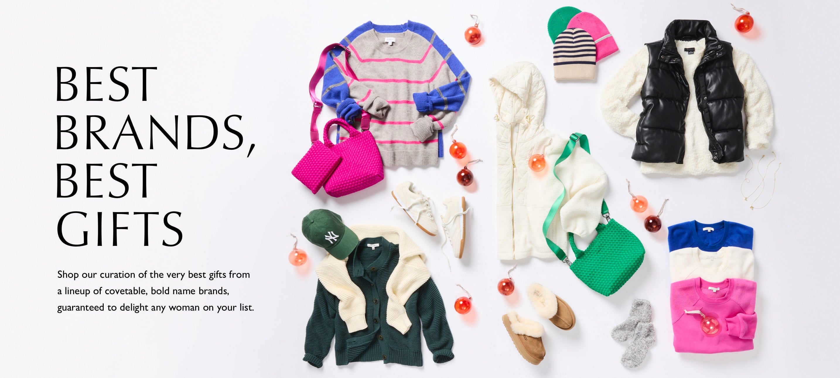 An array of gifts laid out including colorful sweaters in blue, ivory, and pink, knit winter hats, UGG slippers, pink and green handbags, tennis shoes, and socks. Text on image reads: Best Brands, Best Gifts. Shop our curation of the very best gifts from a lineup of covetable, bold name brands, guaranteed to delight any woman on your list